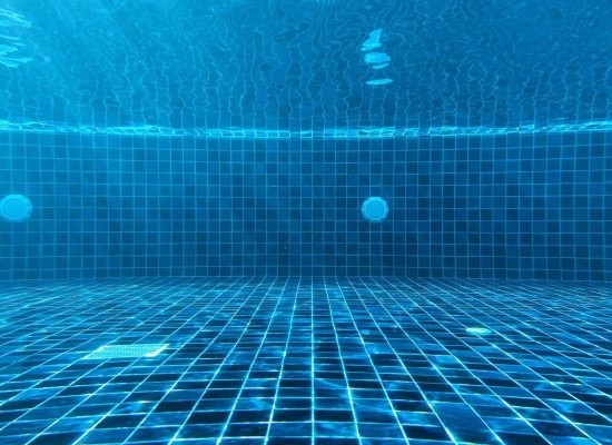 blue swimming pool with water