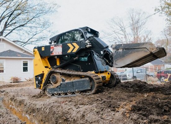 a bulldozer digging in dirt