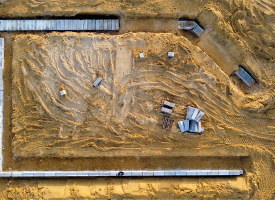 an aerial view of a construction site in the desert